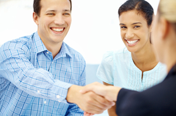 Equity Loans - couple shaking hands with lender